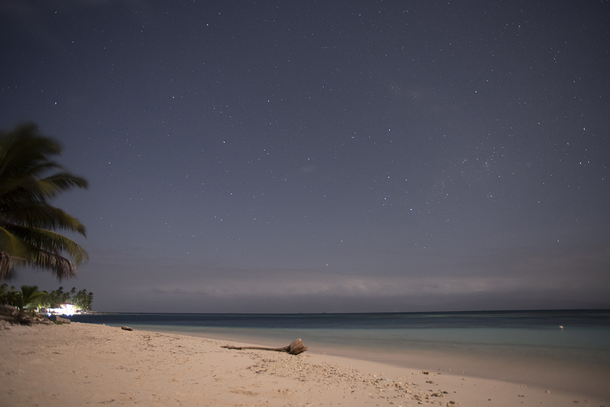 Located in the indigenous province of Guna Yala a few miles north of the Panamanian coast, stars shine through a hazy night on Isla Diablo (Niadub) in March 2018.